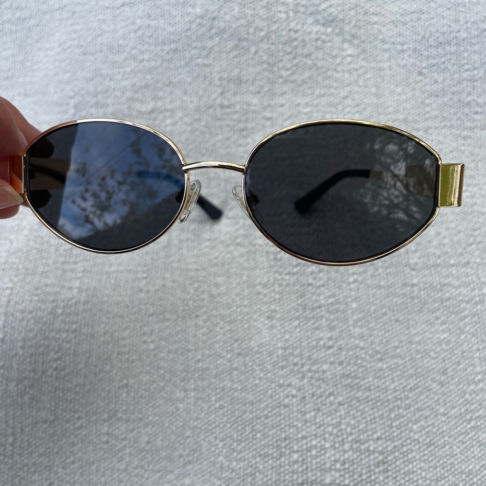 Gold and Black Oval Sunglasses